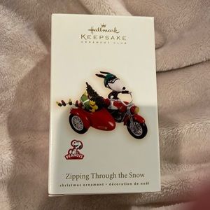 Zipping Through the Snow: Snoopy Ornament